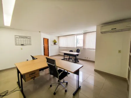 Sala no Edifício Olympus Plaza