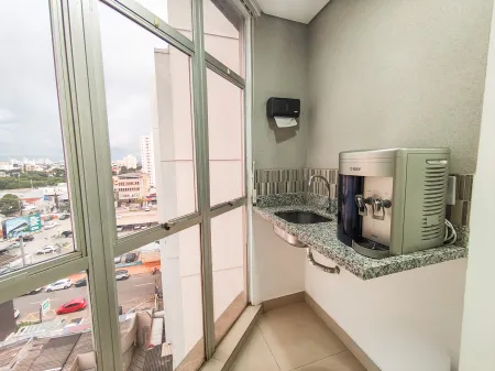 Sala no Edifício Olympus Plaza