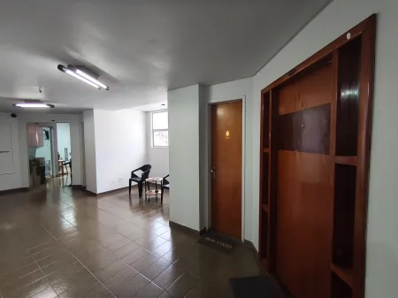 Sala no Edifício Olympus Plaza