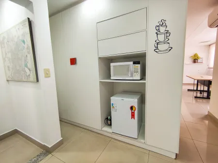 Sala no Edifício Olympus Plaza
