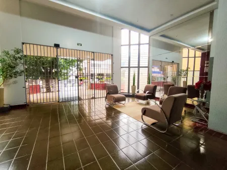 Sala no Edifício Olympus Plaza
