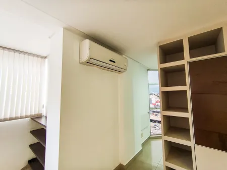 Sala no Edifício Olympus Plaza